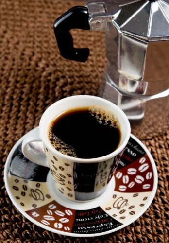 Cafe Santo Domingo Espresso coffee with cup and coffee maker