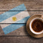 Argentina flag with La Virginia Cafe Torrado Equilibrado Coffee on table